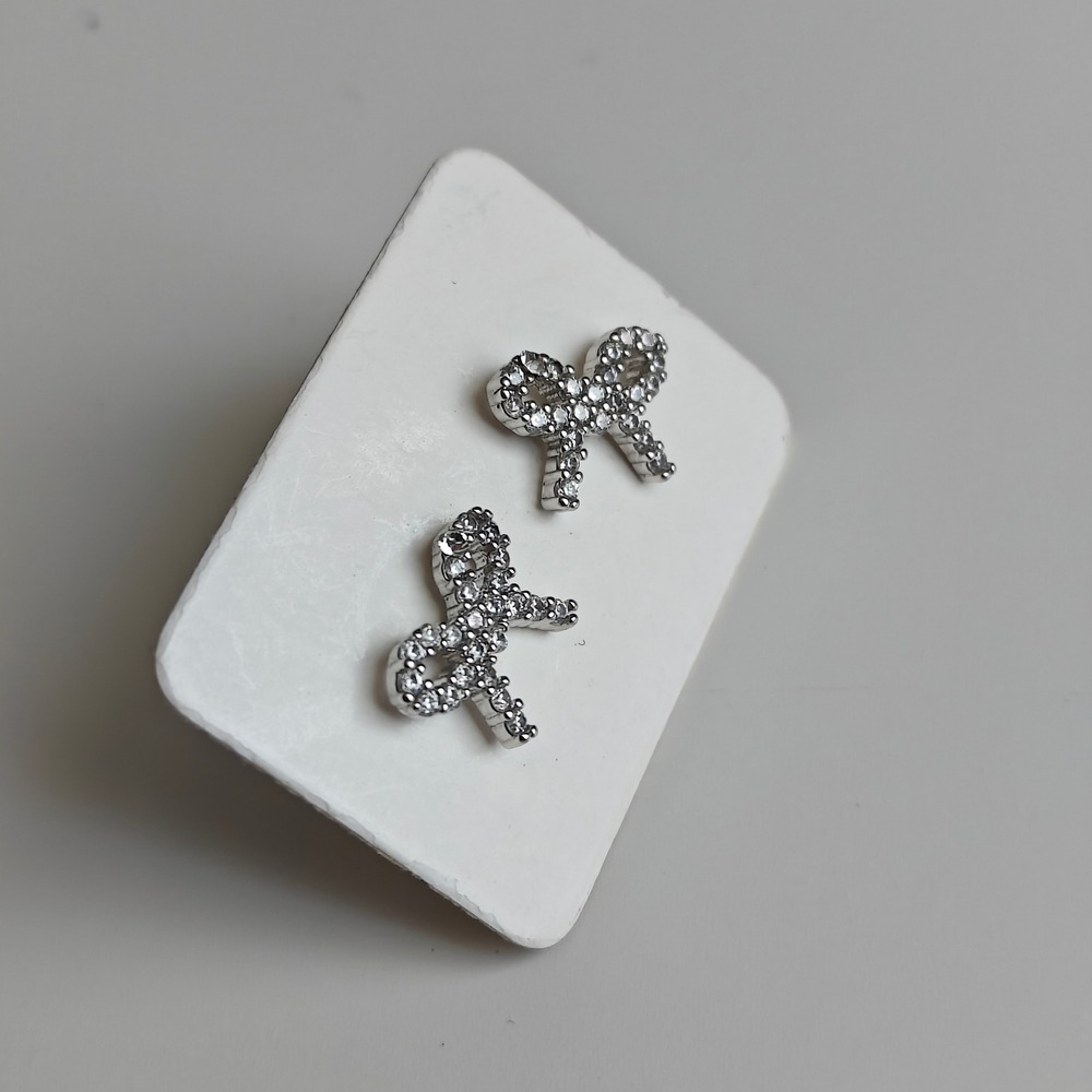 Bow Earrings Silver Tone Clear Pavé Crystal Small Stud Feminine Ribbon Design - Picture 2 of 3